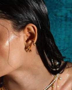 Boucles d'Oreilles Créoles Ondulées Dorées